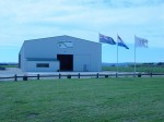 [Side view factory+flags Oct 03.jpg]
